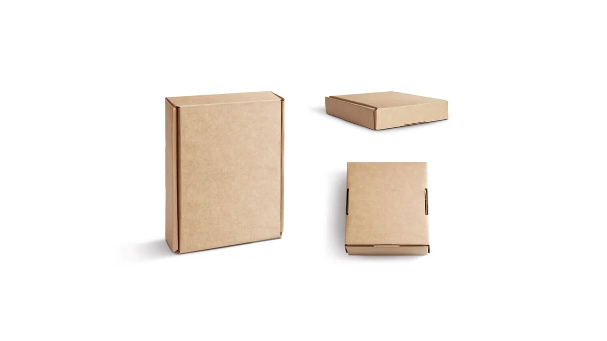 Three shallow kraft 0427 mailer boxes shown closed from different angles