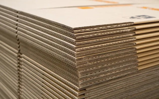 A stack of double wall corrugated sheets seen from the corner, showing how much thickness each wall adds